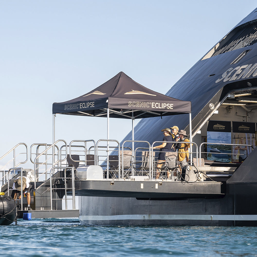 custom printed 10x10 canopy setup at sea beach by Flare Shade